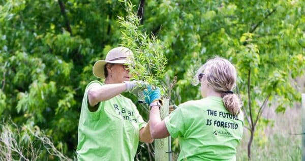 Two Women Planting Trees